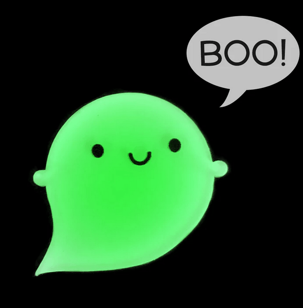 A cute, glowing green ghost with a smiling face and small hands, accompanied by a speech bubble that says 'BOO!'